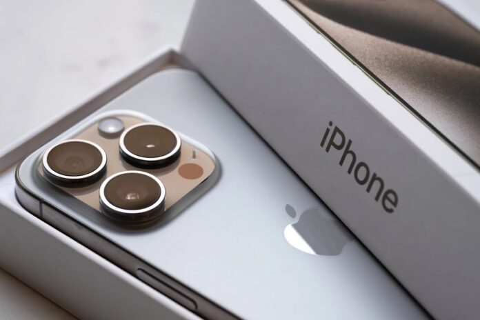 an-iphone-15-pro-is-pictured-resting-inside-its-packaging